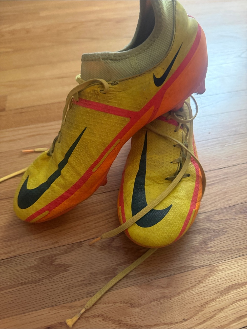 Nike Yellow and Orange Soccer Cleats with Black Swoosh